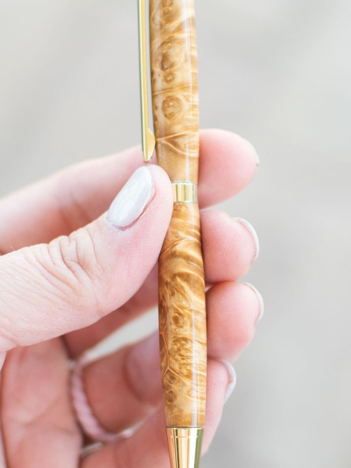 Golden burl wood pen with gold hardware