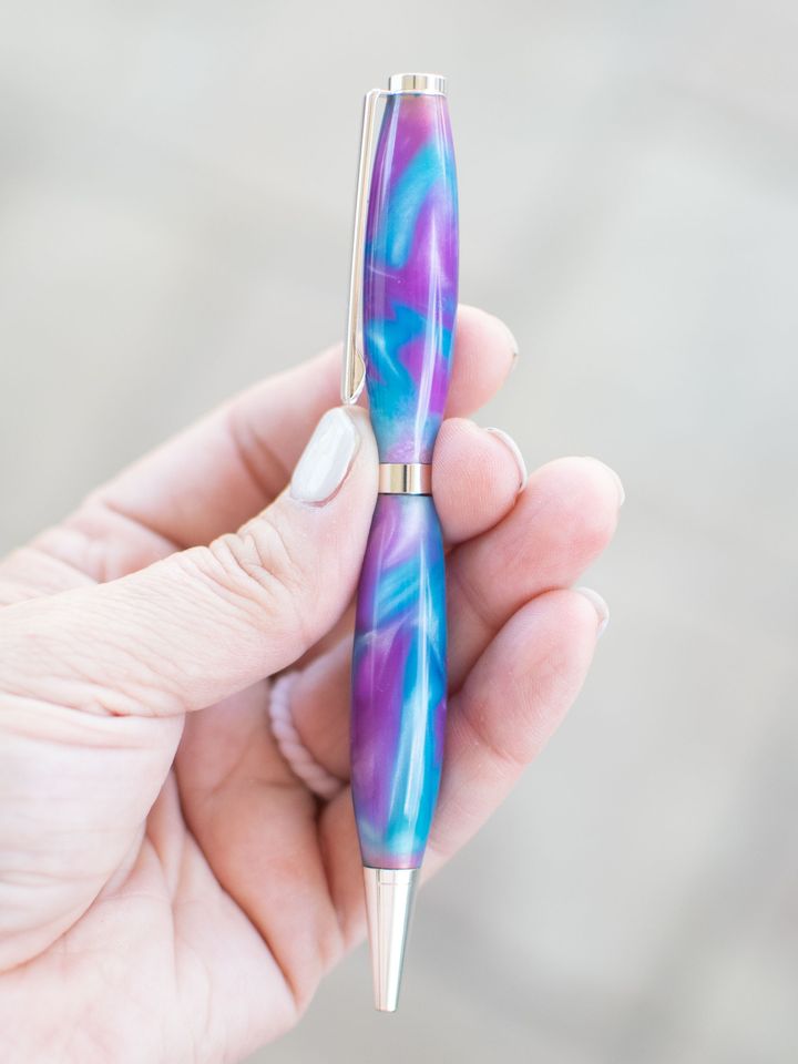 Pen with swirled purple and blue pearl resin and silver hardware